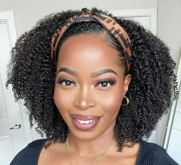 Natural black Jerry curl headband wig by , long, no lace, glueless, free part, 100% human hair with trendy headbands.
