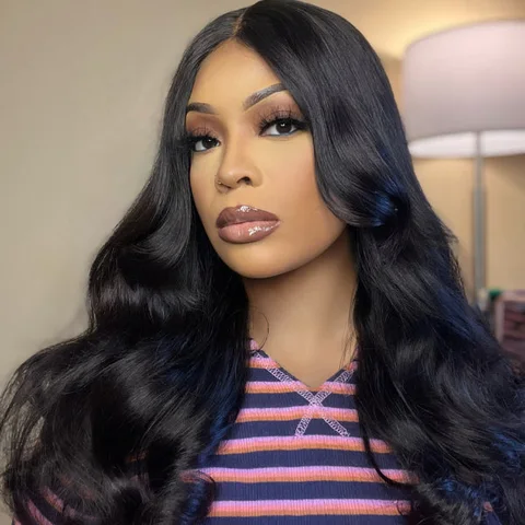 natural black loose wave long wig with minimal HD lace, glueless design, and bangs, styled for a seamless look.