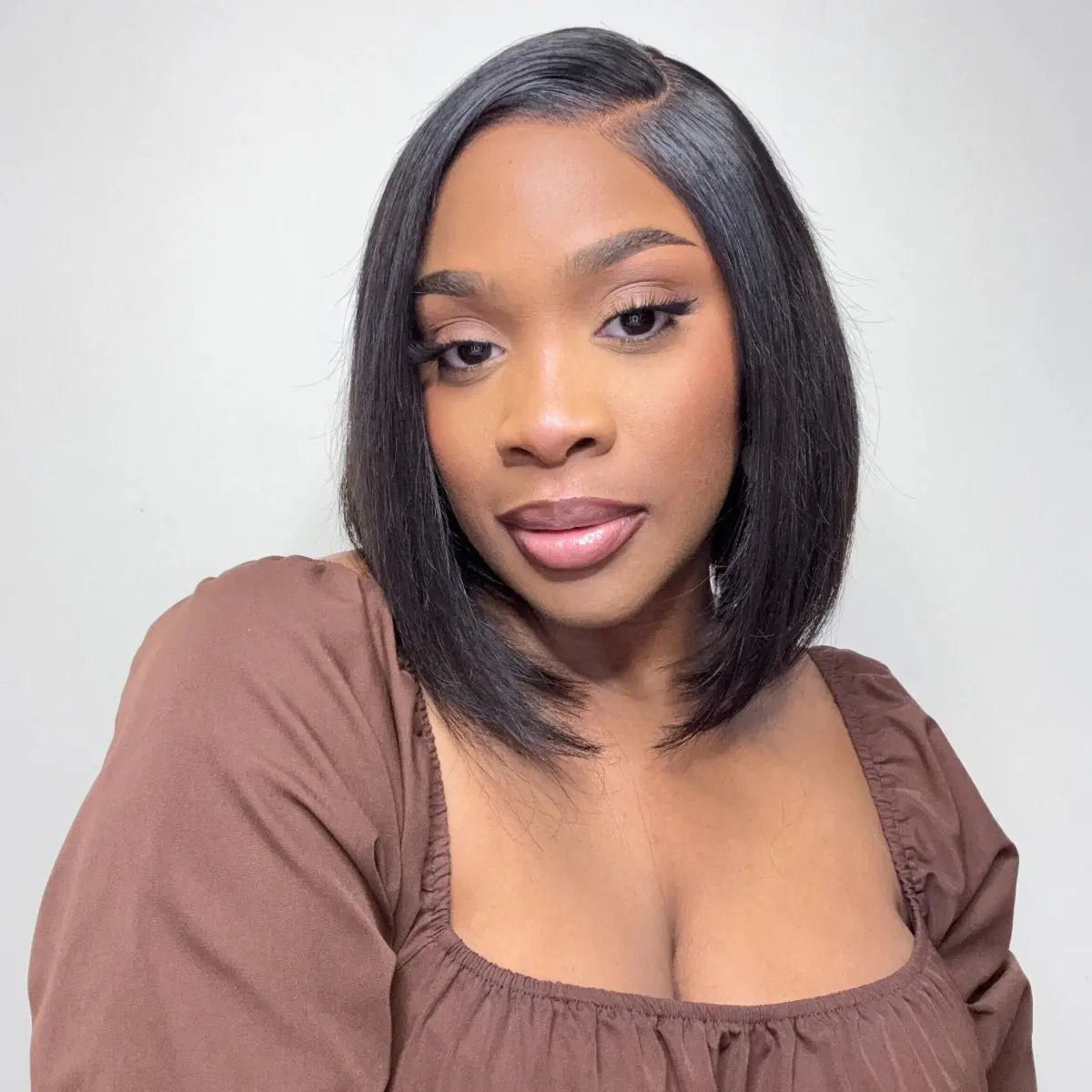 VIP ONLY Super Natural C Part black glueless lace bob wig made of 100% human hair, showcasing its natural hairline and style.