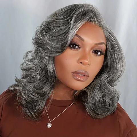 Layered grey wig by featuring shoulder-length wavy style, HD lace, and a minimalistic glueless design